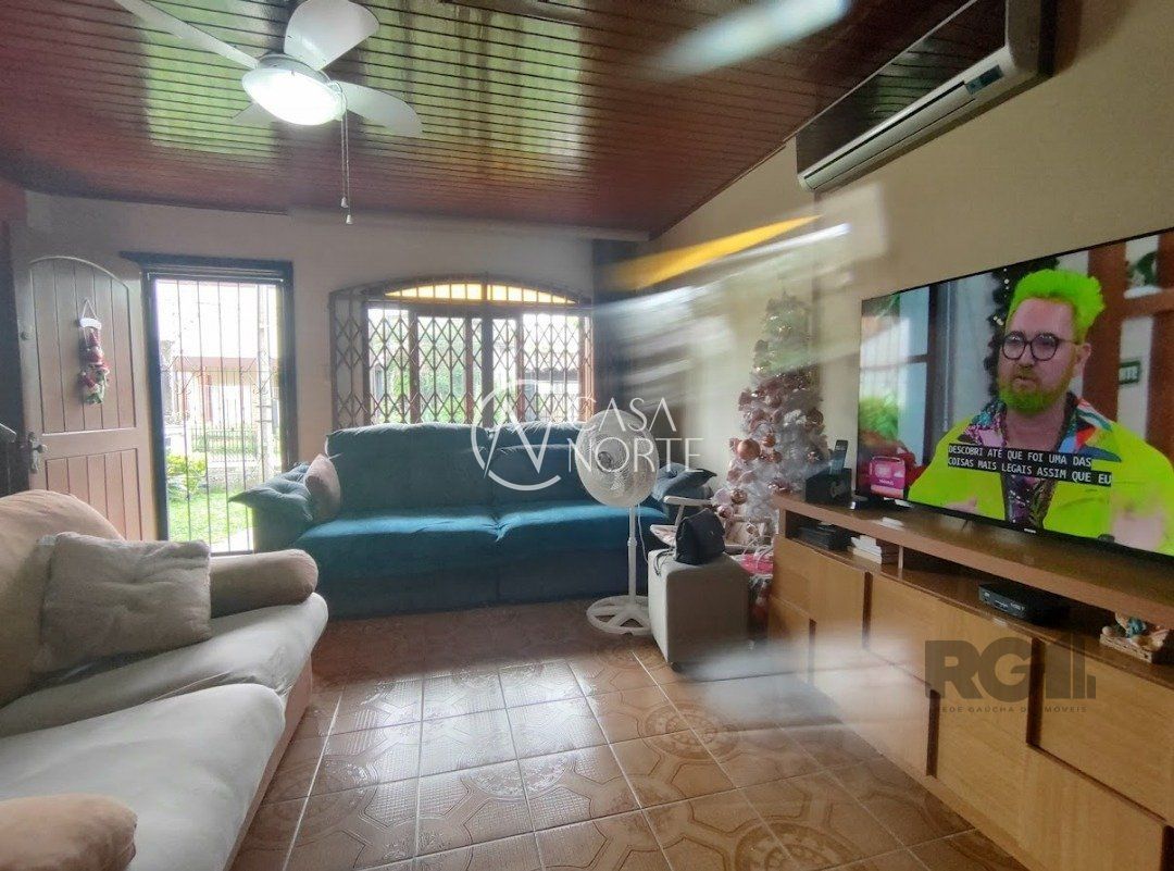 Casa à venda com 3 quartos, 198m², 1 suíte, 2 vagas, Rua Doutor Mário Totta no bairro Tristeza em Porto Alegre