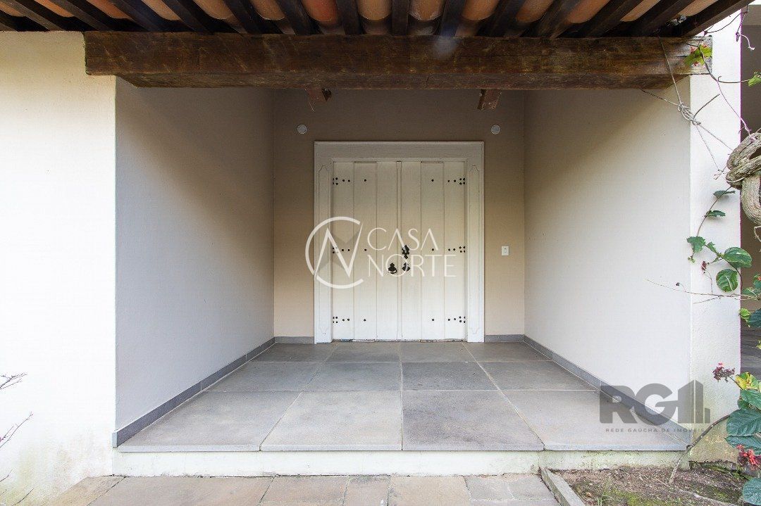 Casa de Condomínio à venda com 5 quartos, 662m², 2 suítes, 4 vagas, Avenida da Cavalhada no bairro Cavalhada em Porto Alegre