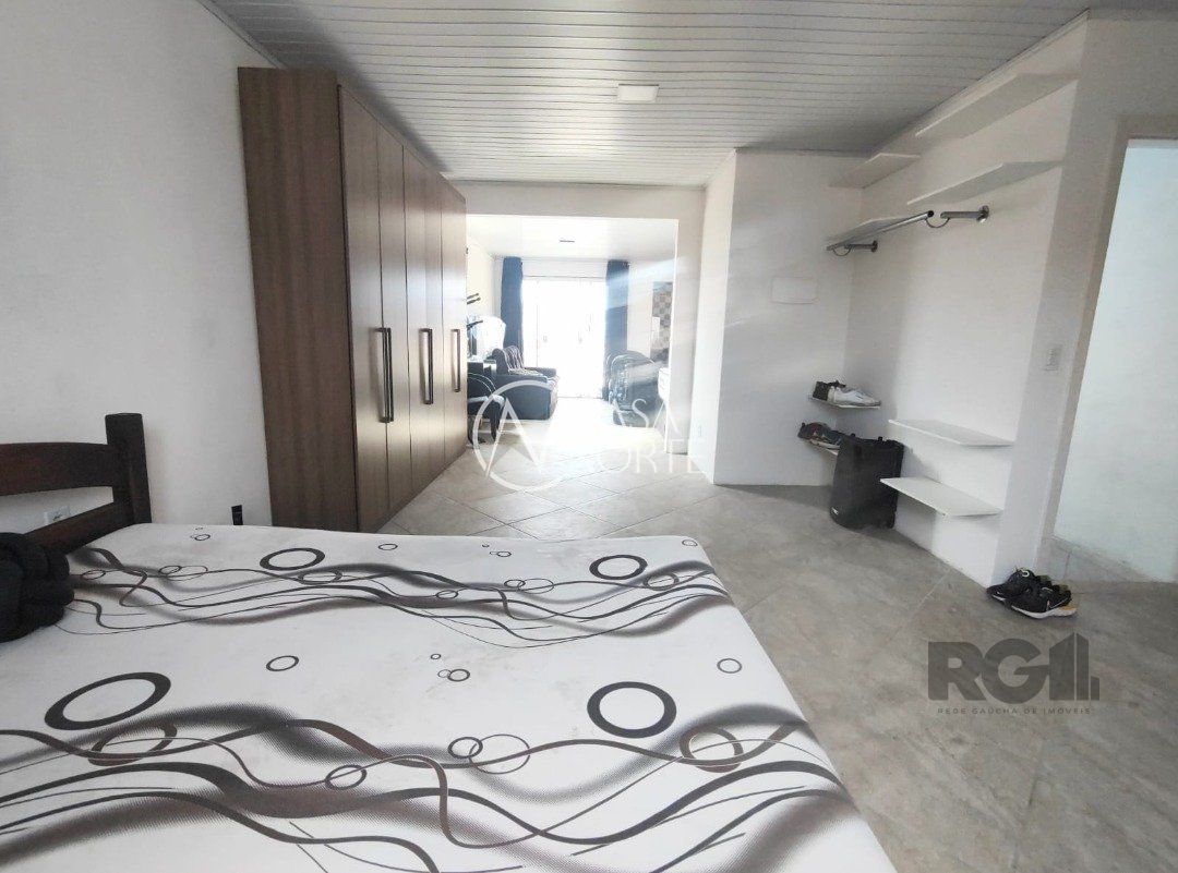 Casa à venda com 3 quartos, 195m², 1 suíte, 1 vaga, Rua Germano Bonow Filho no bairro Hípica em Porto Alegre