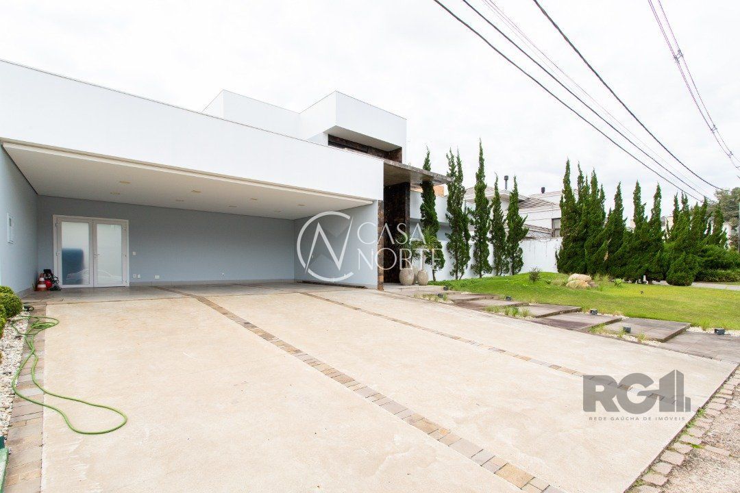 Casa de Condomínio à venda com 4 quartos, 450m², 4 suítes, 3 vagas, Avenida Juca Batista no bairro Chapéu do Sol em Porto Alegre