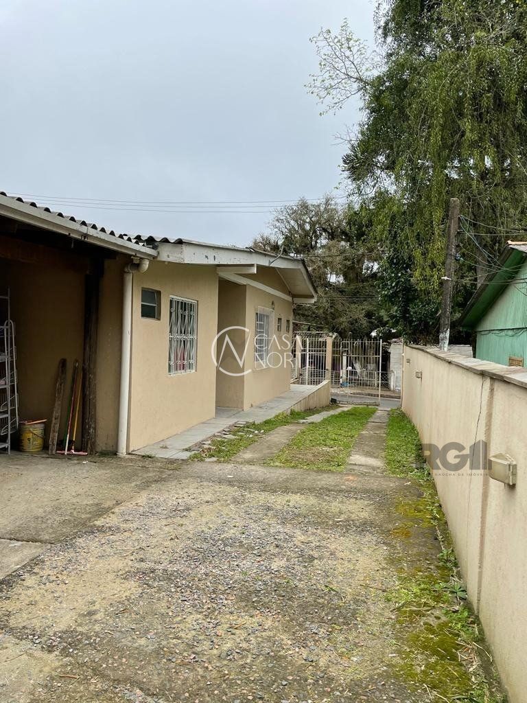Casa à venda com 3 quartos, 150m², 3 vagas, Rua Miguel Ascoleze no bairro Vila Nova em Porto Alegre