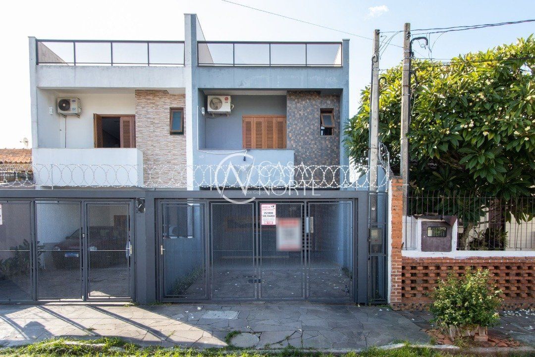 Casa à venda com 3 quartos, 204m², 3 suítes, 2 vagas, Rua Dario Cardoso no bairro Espírito Santo em Porto Alegre