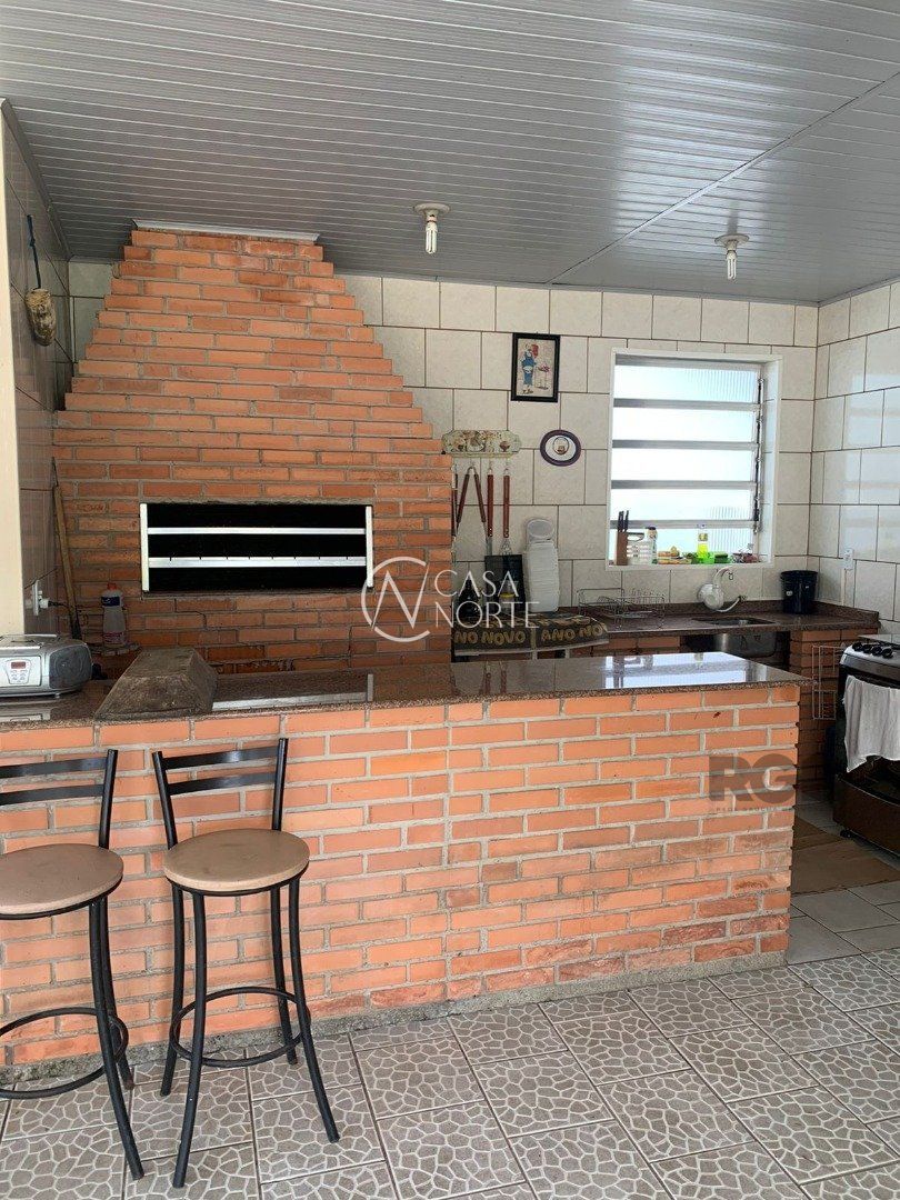 Terreno à venda  com 1250m², Avenida Juca Batista no bairro Belém Novo em Porto Alegre