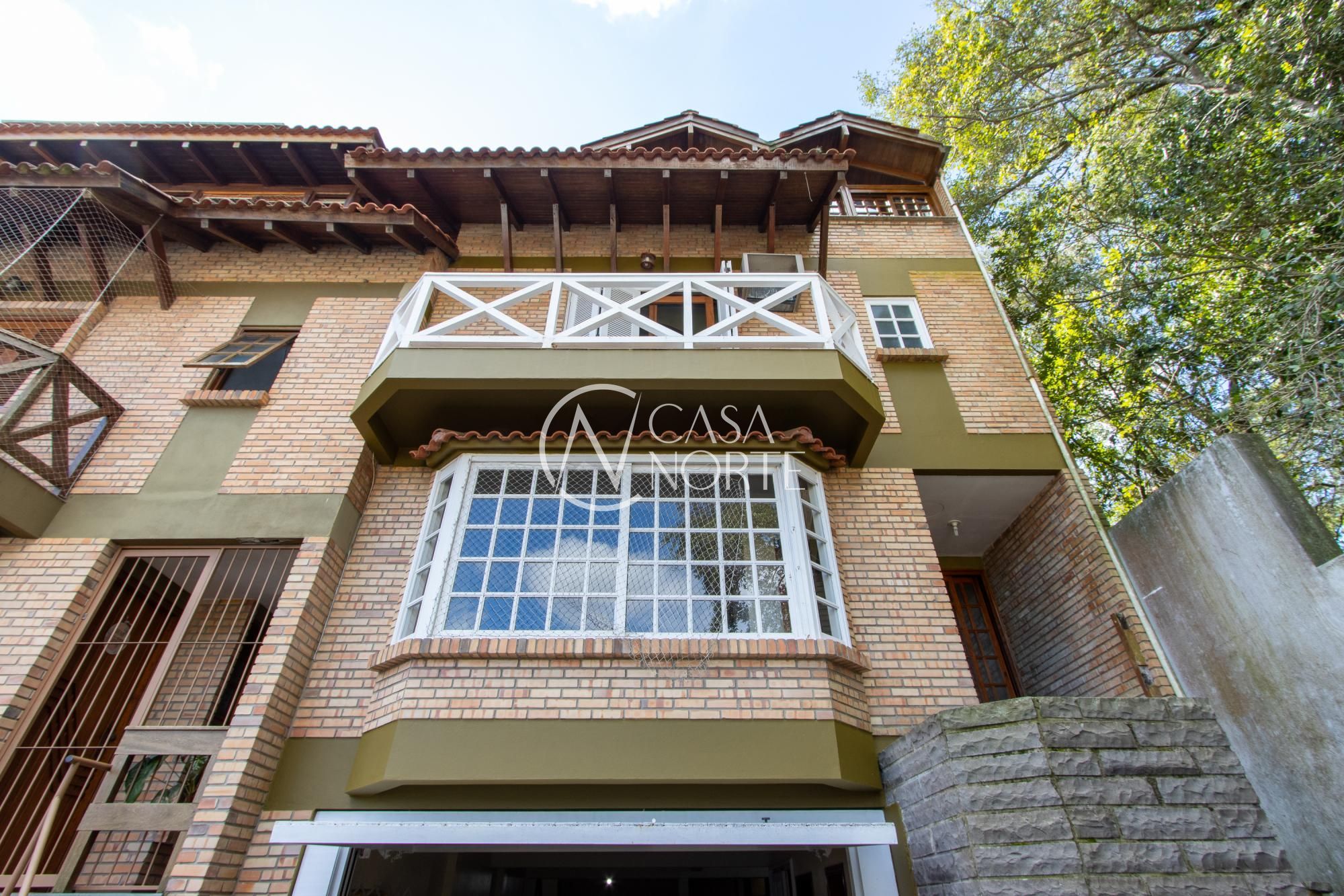 Casa de Condomínio à venda com 3 quartos, 296m², 1 suíte, 4 vagas, Rua Doutor Arnaldo da Silva Ferreira no bairro Jardim Isabel em Porto Alegre