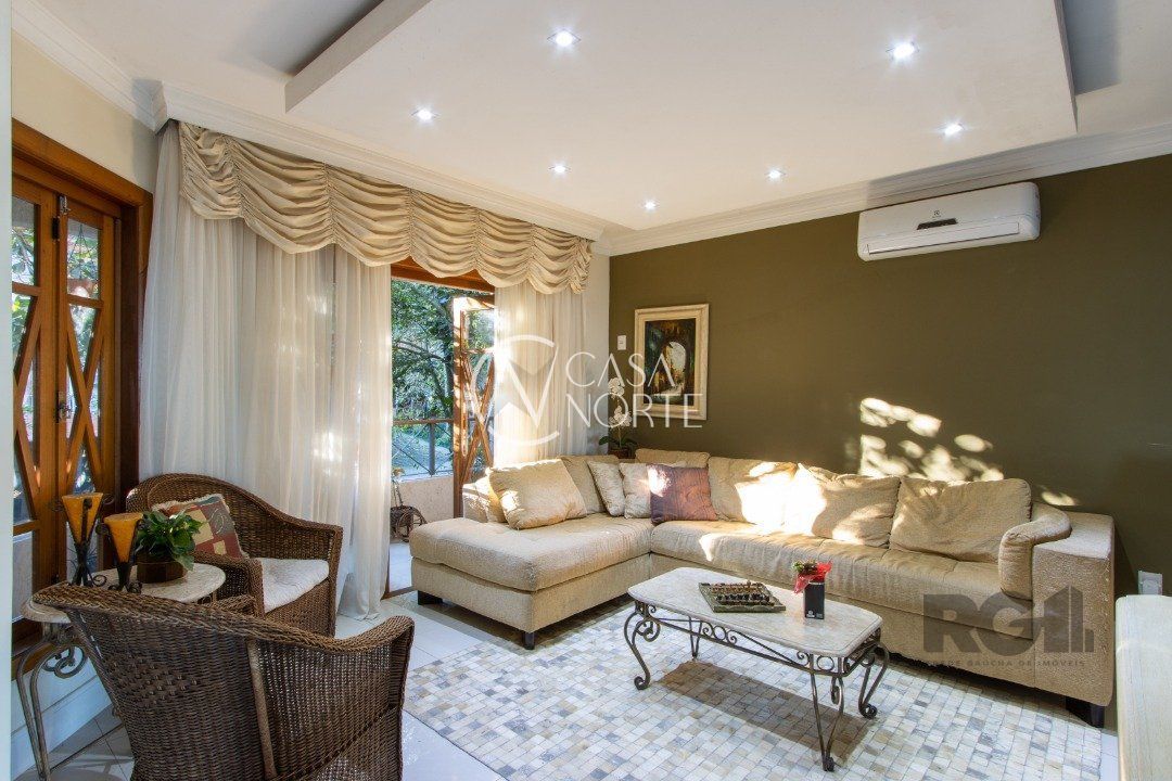 Casa de Condomínio à venda com 3 quartos, 249m², 1 suíte, 4 vagas, Rua José Sanguinetti no bairro Jardim Isabel em Porto Alegre