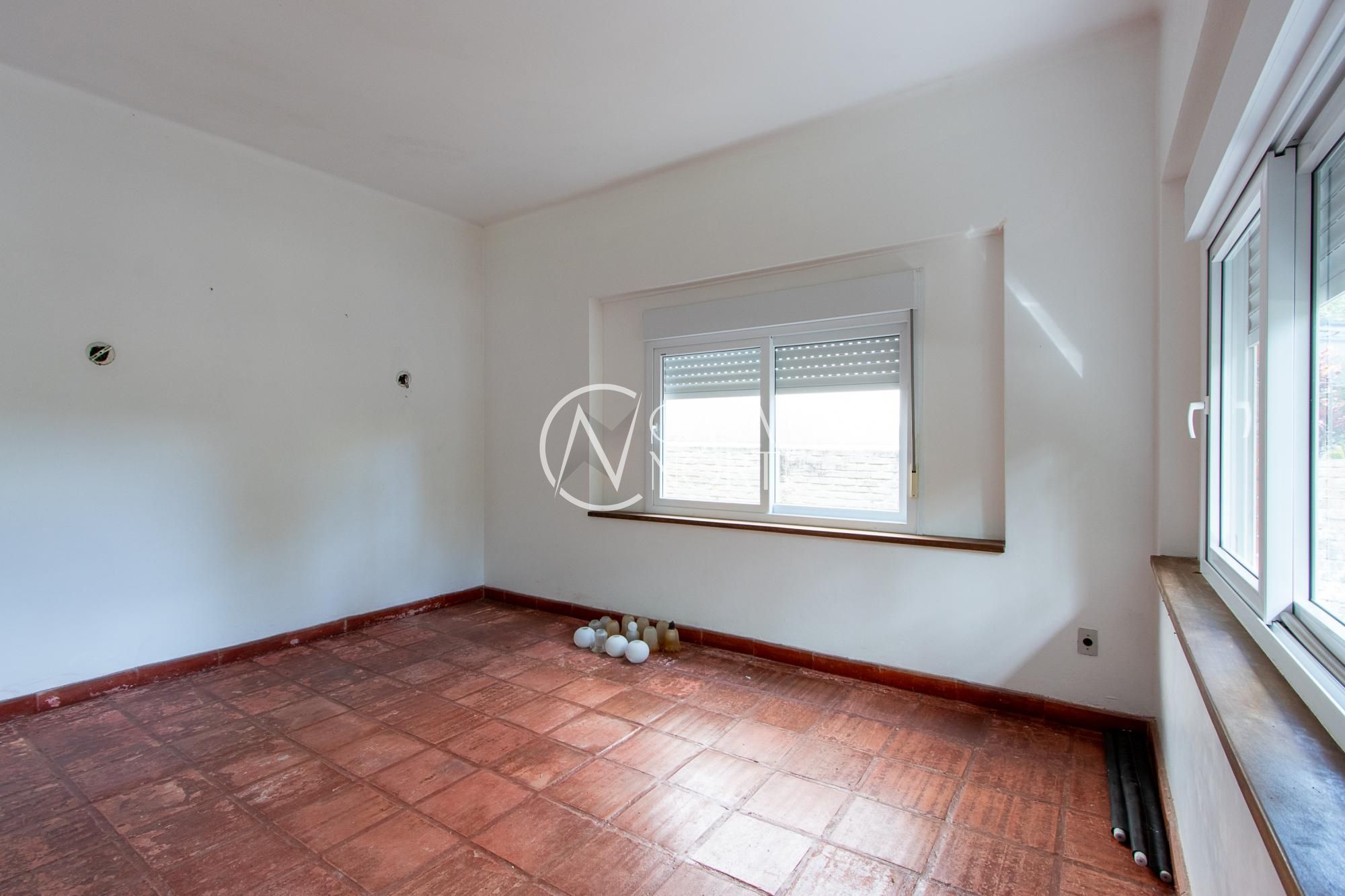 Casa à venda com 4 quartos, 468m², 1 suíte, 4 vagas, Avenida Pereira Passos no bairro Vila Assunção em Porto Alegre