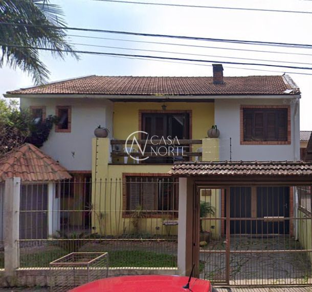 Casa à venda com 4 quartos, 275m², 1 suíte, 2 vagas, Rua Irmão Augusto Duflot no bairro Serraria em Porto Alegre