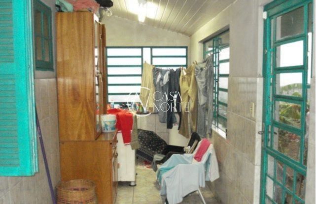 Casa à venda com 3 quartos, 130m², 1 vaga, Rua Lydia Sperb no bairro Vila Nova em Porto Alegre