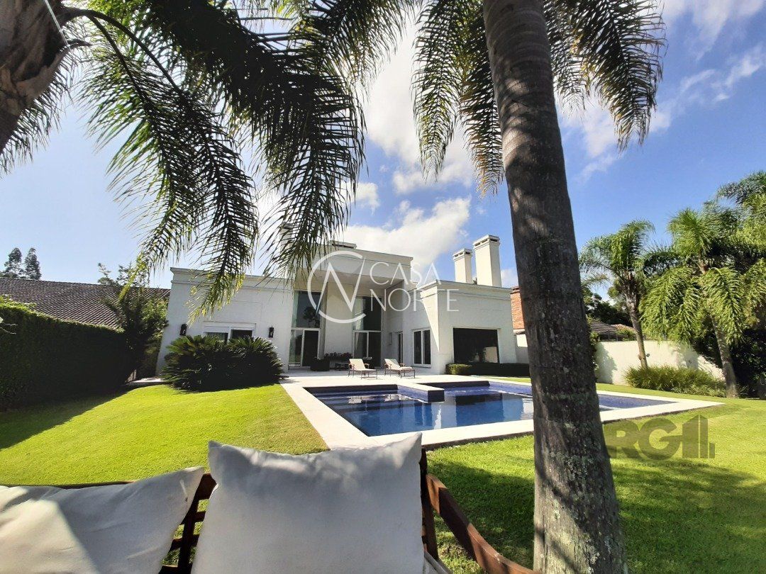 Casa de Condomínio à venda com 4 quartos, 423m², 4 suítes, 4 vagas, Avenida Juca Batista no bairro Belém Novo em Porto Alegre