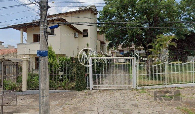 Casa de Condomínio à venda com 4 quartos, 72m², 1 suíte, 2 vagas, Rua Catumbi no bairro Medianeira em Porto Alegre