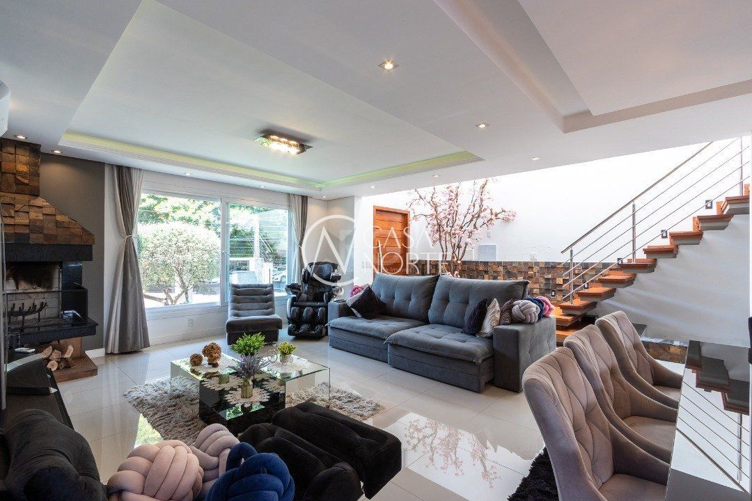 Casa à venda com 3 quartos, 420m², 3 suítes, 8 vagas, Rua Conselheiro Xavier da Costa no bairro Ipanema em Porto Alegre