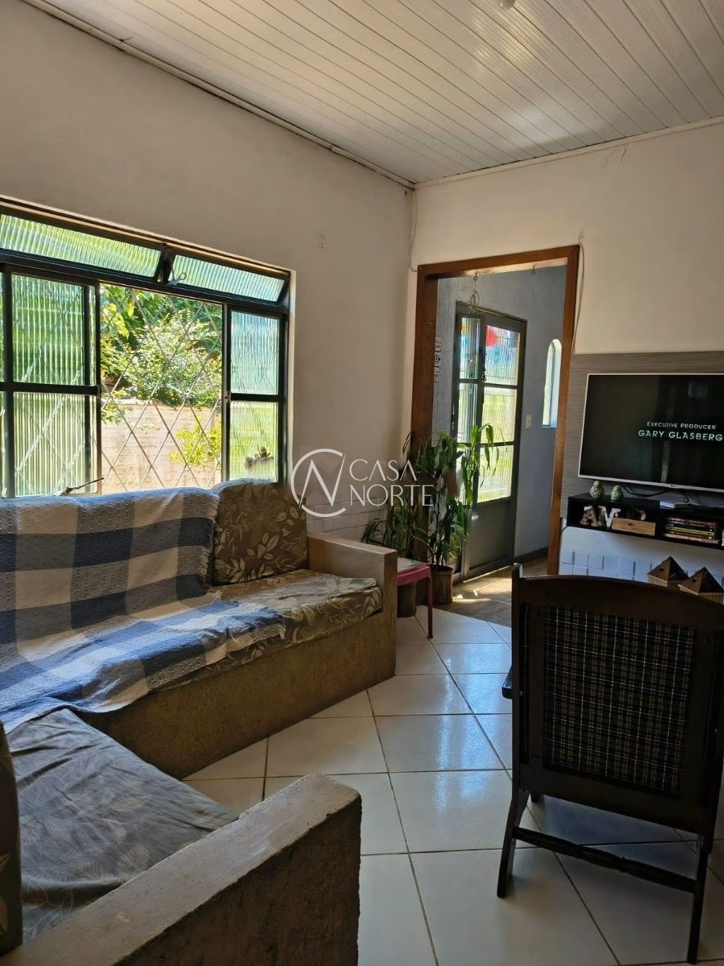 Casa à venda com 3 quartos, 210m², 1 suíte, 6 vagas, Rua Jerolomo Minuzo no bairro Vila Nova em Porto Alegre