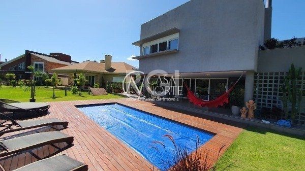 Casa de Condomínio à venda com 4 quartos, 478m², 4 suítes, 4 vagas, Avenida Juca Batista no bairro Chapéu do Sol em Porto Alegre