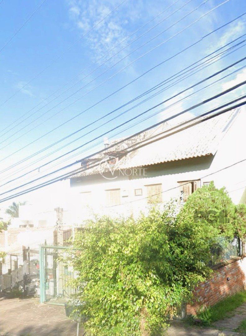 Casa à venda com 3 quartos, 231m², 1 suíte, 3 vagas, Rua Doutor Pitrez no bairro Ipanema em Porto Alegre