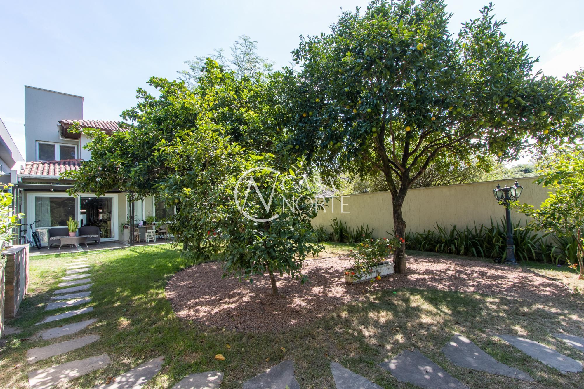 Casa de Condomínio à venda com 3 quartos, 294m², 3 suítes, 3 vagas, Avenida Juca Batista no bairro Belém Novo em Porto Alegre