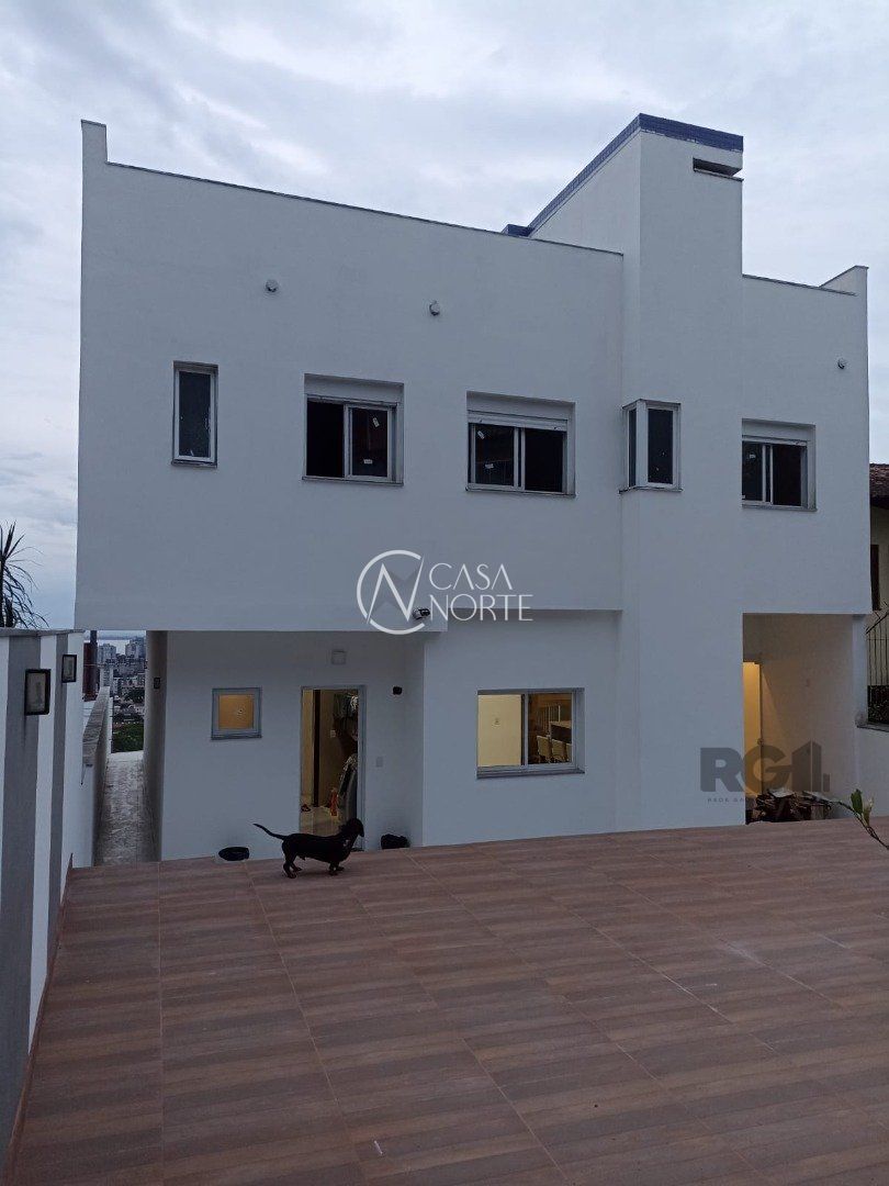 Casa de Condomínio à venda com 3 quartos, 300m², 1 suíte, 4 vagas, Rua Alcebiades Antônio dos Santos no bairro Nonoai em Porto Alegre