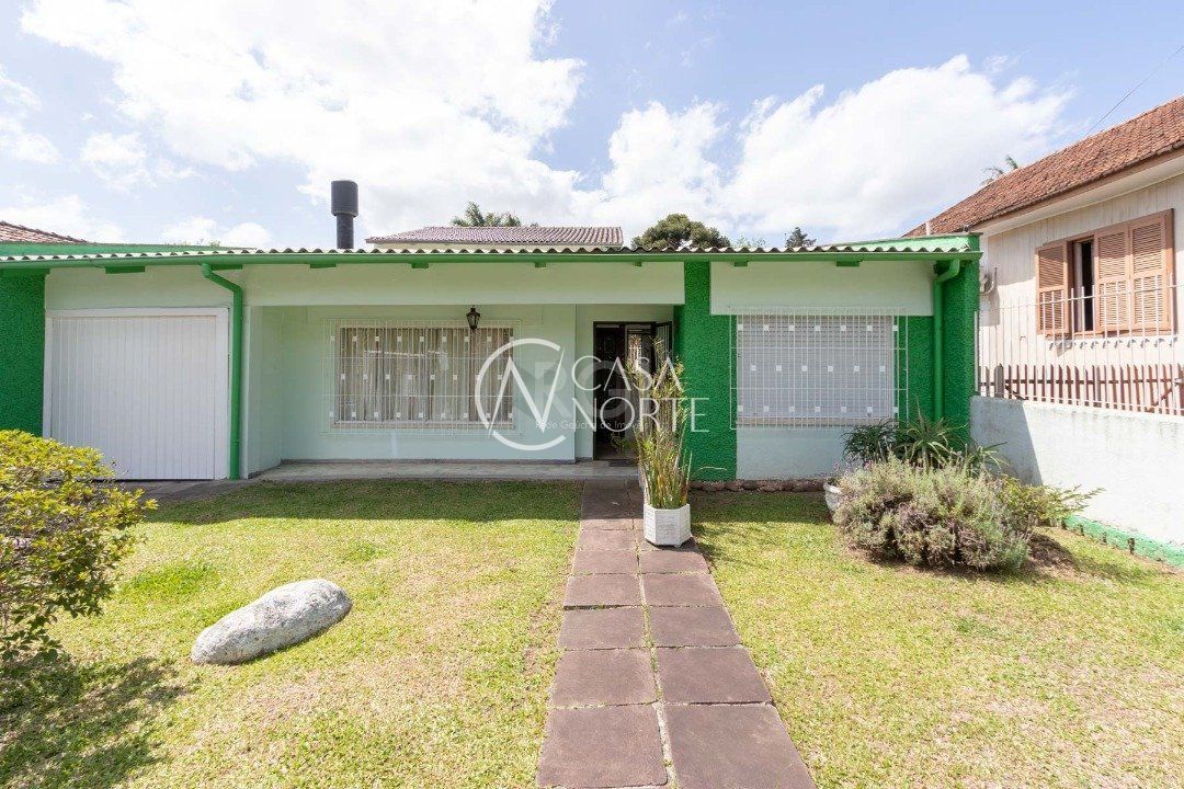 Casa à venda com 4 quartos, 182m², 1 suíte, 4 vagas, Rua Morano Calabro no bairro Jardim Isabel em Porto Alegre