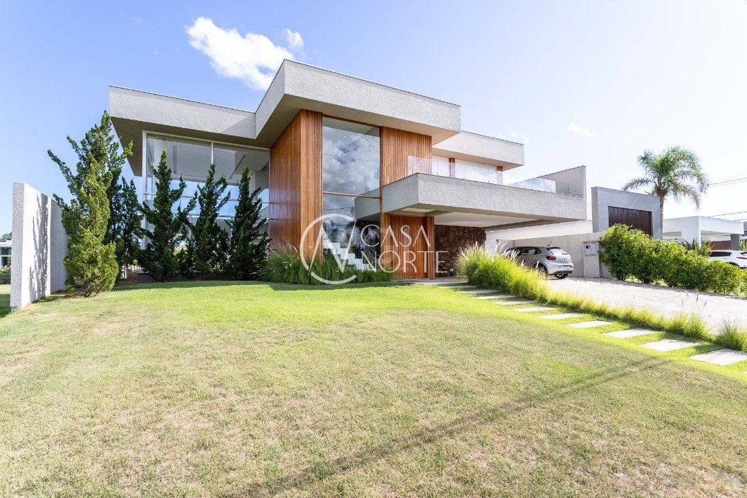 Casa de Condomínio à venda com 3 quartos, 411m², 3 suítes, 6 vagas, Avenida Juca Batista no bairro Belém Novo em Porto Alegre