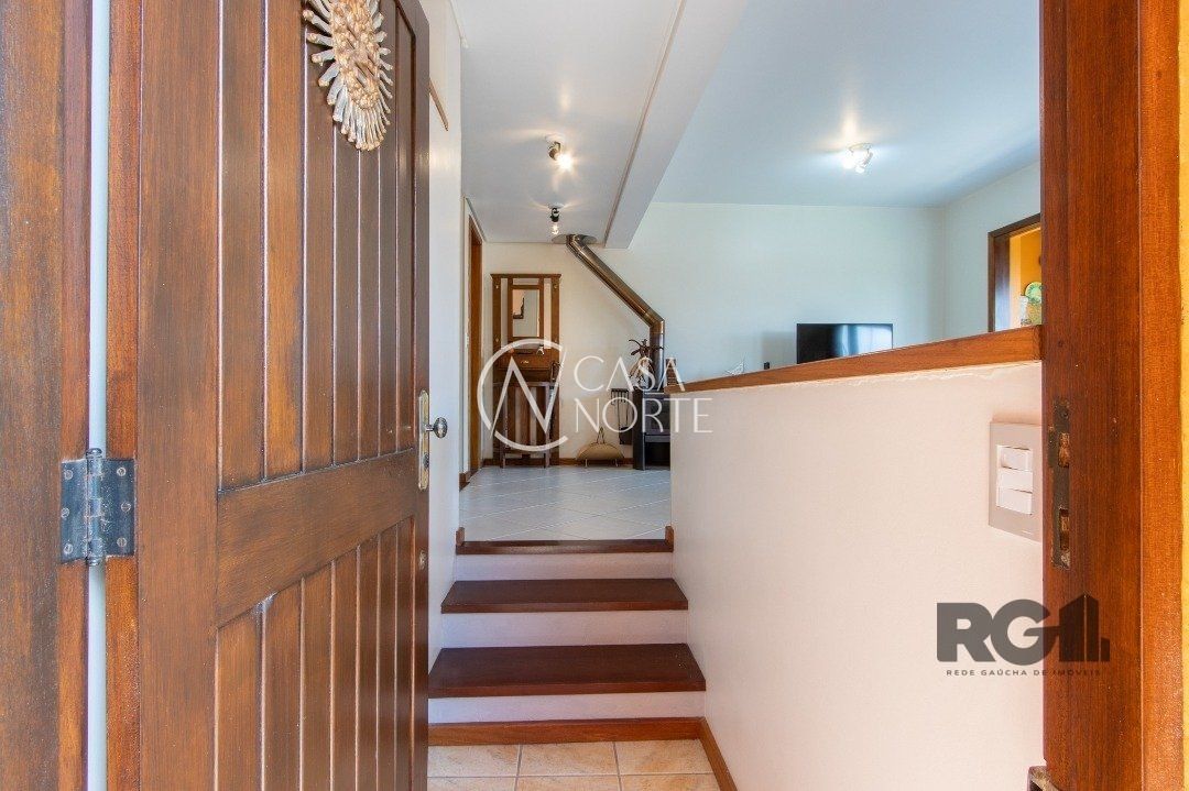 Casa de Condomínio à venda com 3 quartos, 274m², 1 suíte, 2 vagas, Rua Álvaro Guterres no bairro Tristeza em Porto Alegre