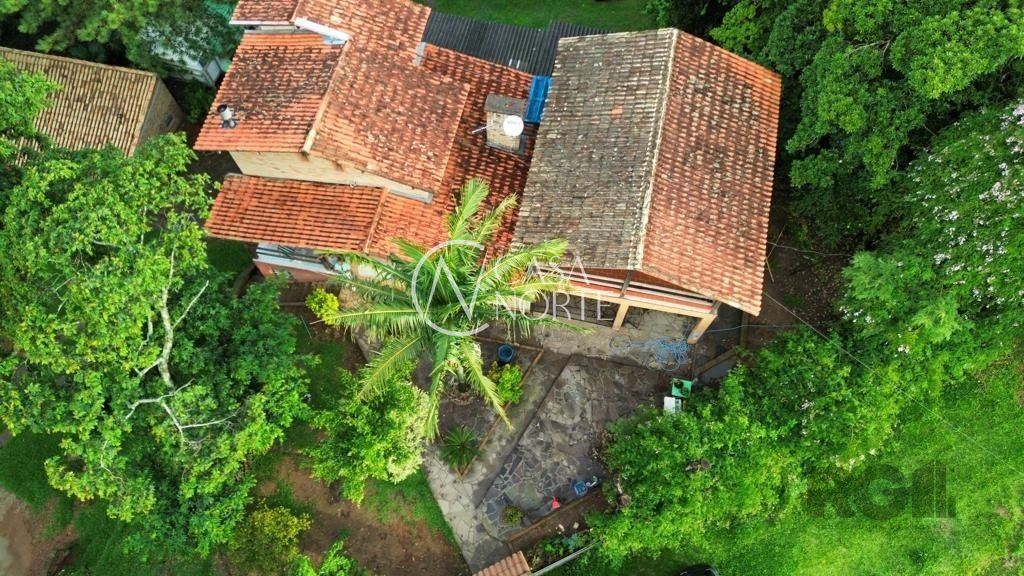 Casa à venda com 4 quartos, 350m², 2 suítes, 9 vagas, Rua Pedro de Oliveira Franca no bairro Hípica em Porto Alegre