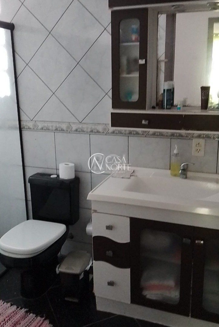 Casa à venda com 3 quartos, 114m², 1 vaga, Rua Mata Coelho no bairro Nonoai em Porto Alegre