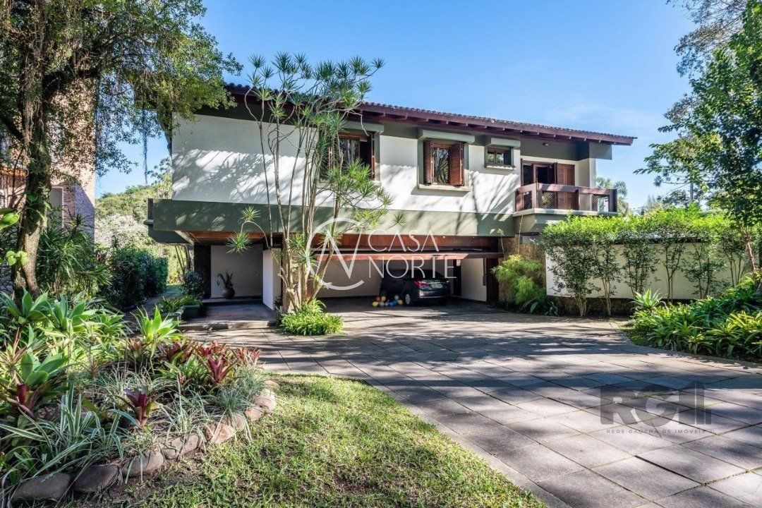 Casa de Condomínio à venda com 4 quartos, 650m², 2 suítes, 5 vagas, Avenida da Cavalhada no bairro Cavalhada em Porto Alegre