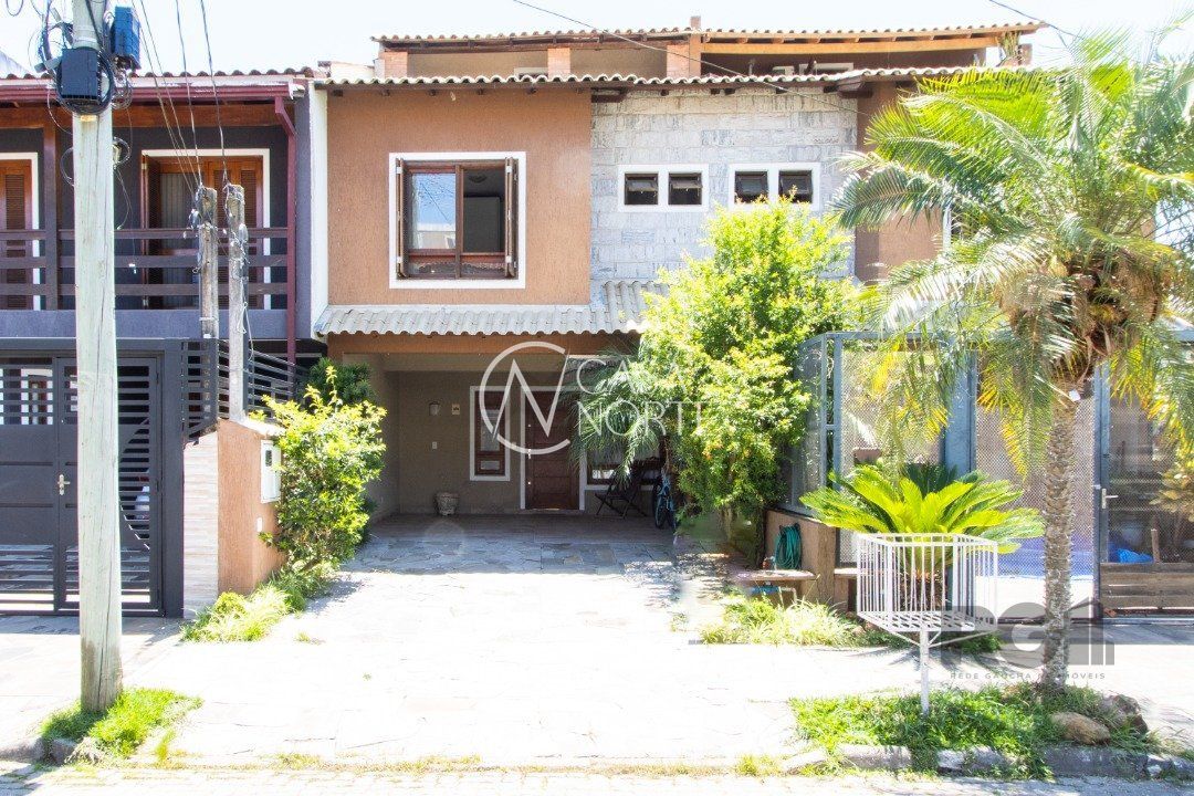 Casa à venda com 3 quartos, 139m², 1 suíte, 2 vagas, Rua Pau-Brasil no bairro Hípica em Porto Alegre