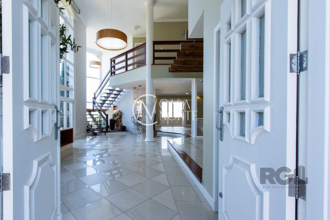 Casa de Condomínio à venda com 4 quartos, 483m², 2 suítes, 3 vagas, Rua Alcebiades Antônio dos Santos no bairro Nonoai em Porto Alegre