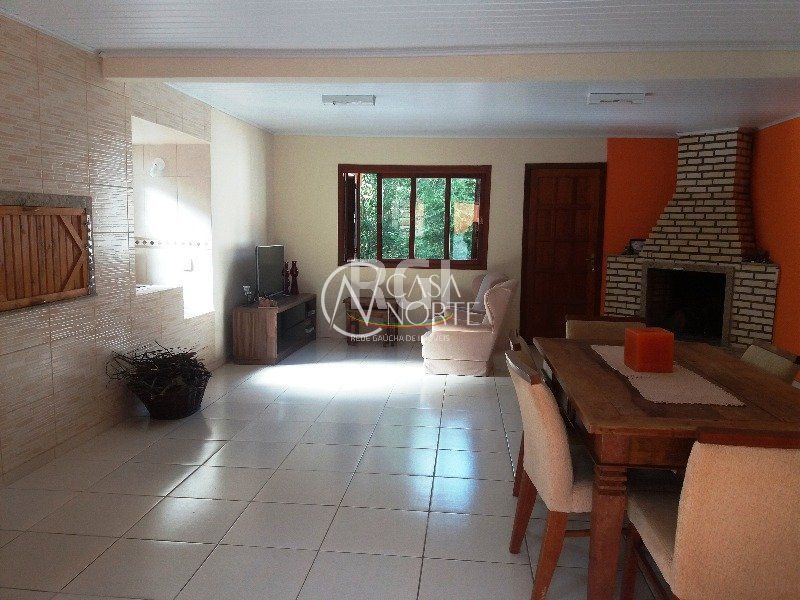 Casa à venda com 5 quartos, 250m², 3 suítes, 2 vagas, Rua Gavea no bairro Ipanema em Porto Alegre