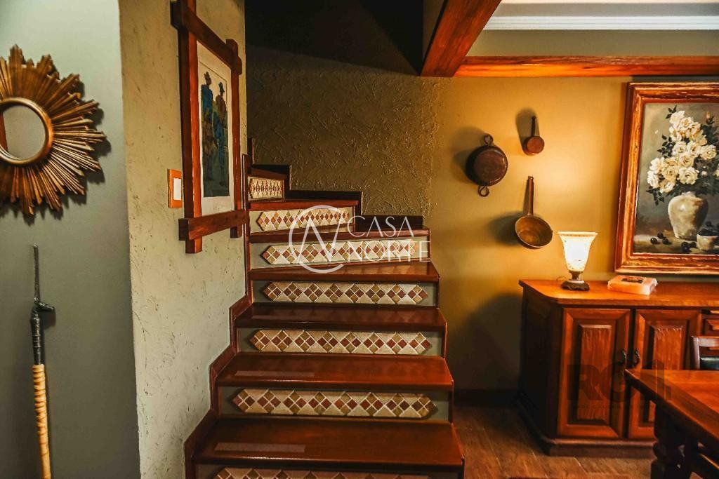 Casa de Condomínio à venda com 3 quartos, 246m², 1 suíte, 2 vagas, Rua Manajó no bairro Vila Assunção em Porto Alegre