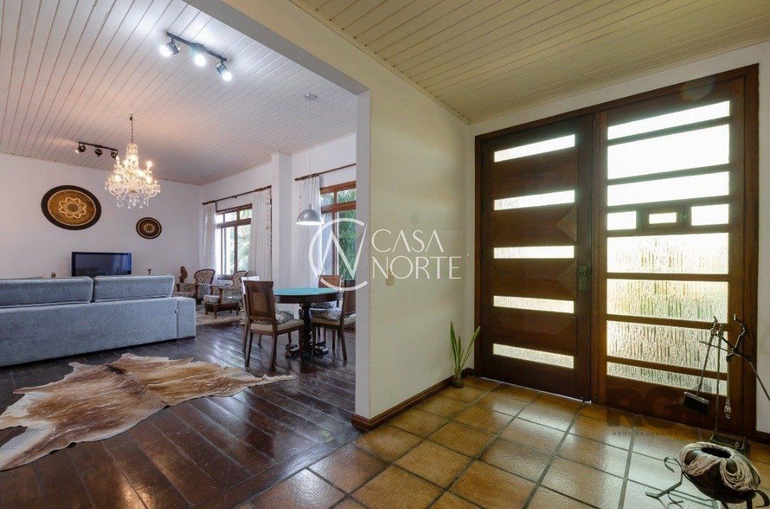 Casa de Condomínio à venda com 3 quartos, 450m², 1 suíte, 3 vagas, Avenida Firmino Octavio Bimbi no bairro Cavalhada em Porto Alegre