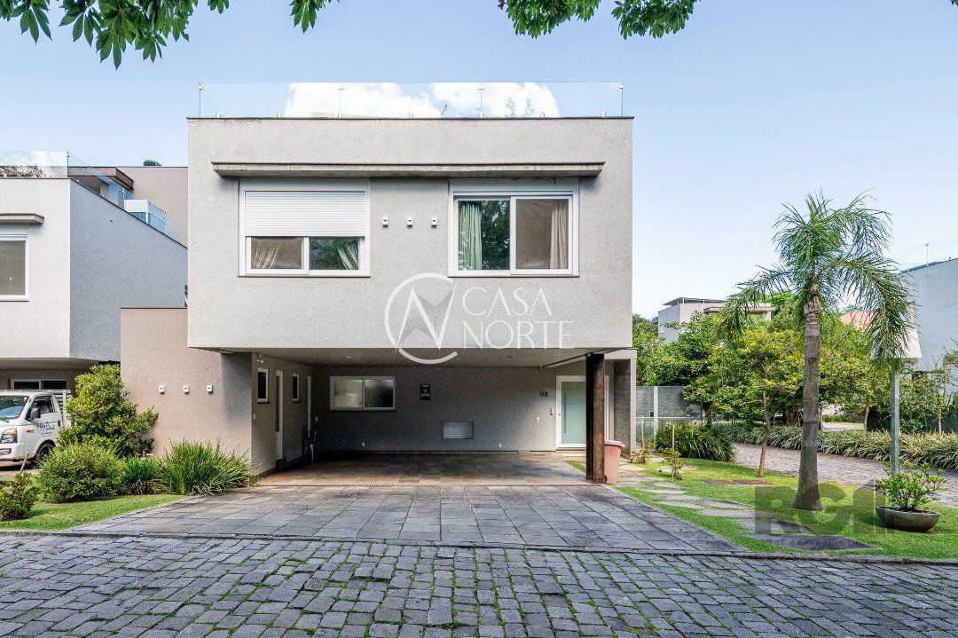 Casa de Condomínio à venda com 3 quartos, 513m², 3 suítes, 4 vagas, Rua Sargento Nicolau Dias de Farias no bairro Tristeza em Porto Alegre