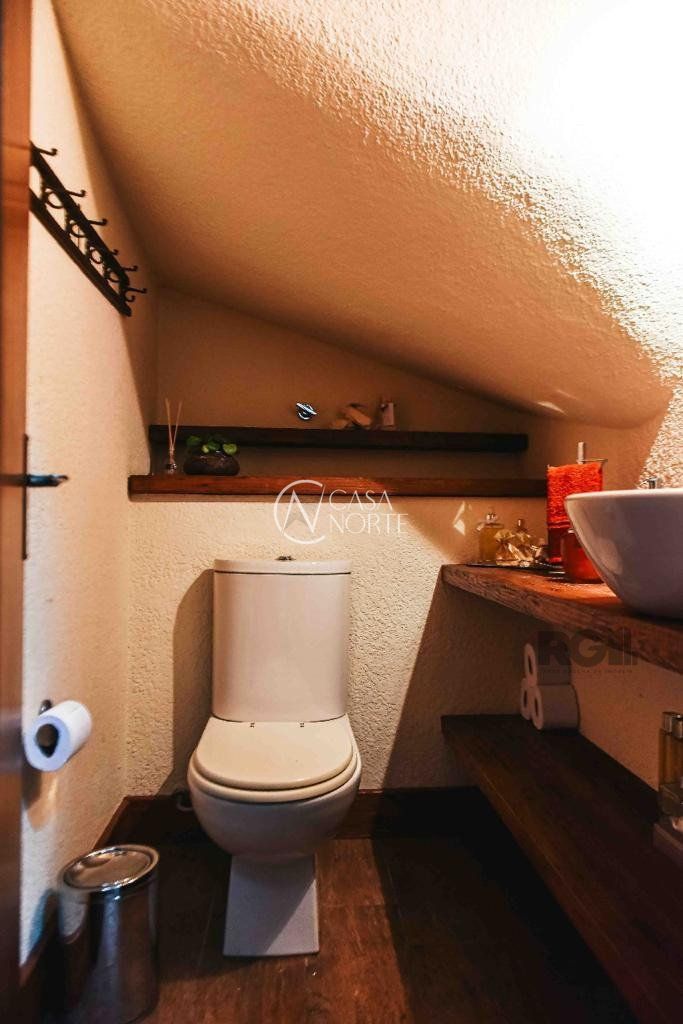 Casa de Condomínio à venda com 3 quartos, 246m², 1 suíte, 2 vagas, Rua Manajó no bairro Vila Assunção em Porto Alegre