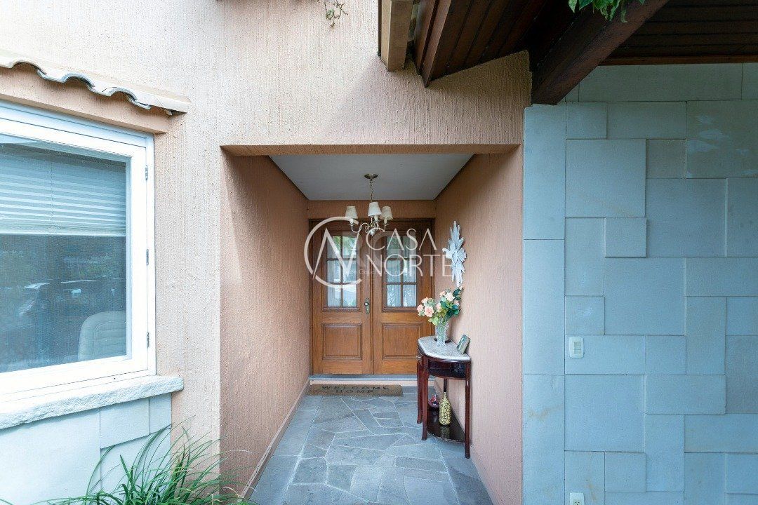 Casa de Condomínio à venda com 4 quartos, 386m², 4 suítes, 4 vagas, Avenida Juca Batista no bairro Belém Novo em Porto Alegre