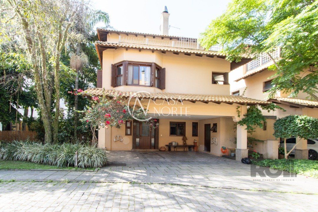Casa de Condomínio à venda com 4 quartos, 380m², 2 suítes, 3 vagas, Avenida Otto Niemeyer no bairro Tristeza em Porto Alegre