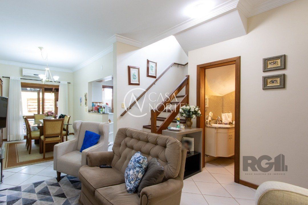 Casa de Condomínio à venda com 3 quartos, 186m², 1 suíte, 2 vagas, Avenida Eduardo Prado no bairro Cavalhada em Porto Alegre