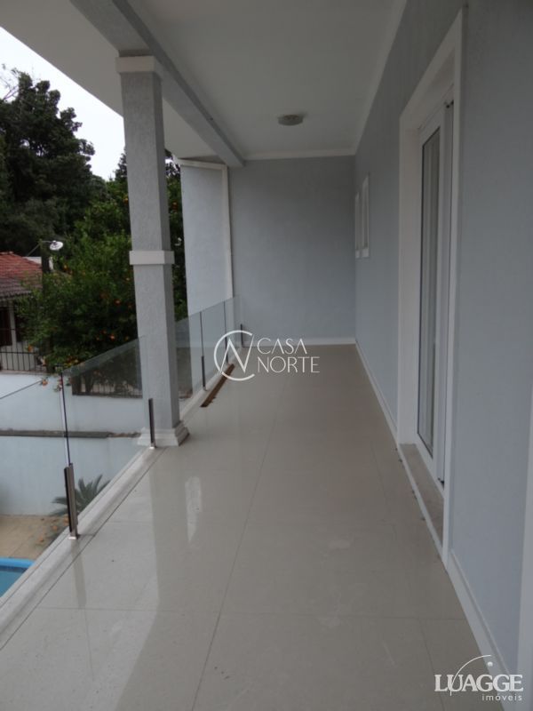 Casa à venda com 3 quartos, 305m², 3 suítes, 4 vagas, Avenida Fabio Araujo Santos no bairro Nonoai em Porto Alegre