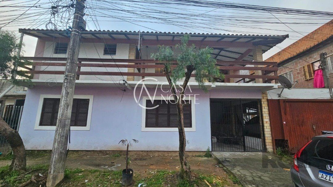Casa à venda com 3 quartos, 150m², 1 vaga, Rua Hesiodo Andrade no bairro Hípica em Porto Alegre