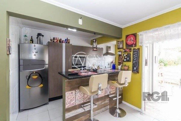 Casa à venda com 3 quartos, 182m², 1 suíte, 2 vagas, Travessa Orion no bairro Cristo Redentor em Porto Alegre