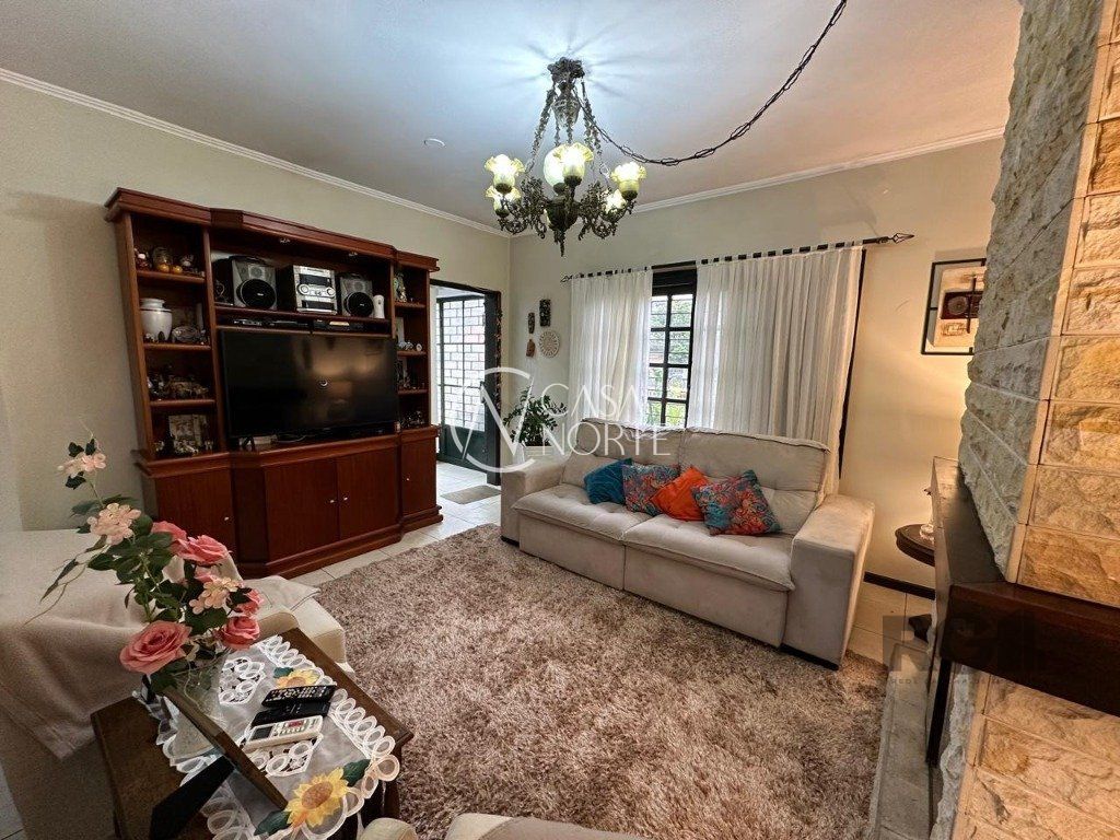 Casa à venda com 3 quartos, 260m², 2 vagas, Avenida Coronel Gastão Haslocher Mazeron no bairro Medianeira em Porto Alegre