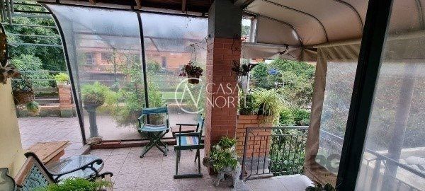 Casa à venda com 4 quartos, 360m², 2 suítes, 5 vagas, Rua Doutor Jorge Fayet no bairro Chácara das Pedras em Porto Alegre