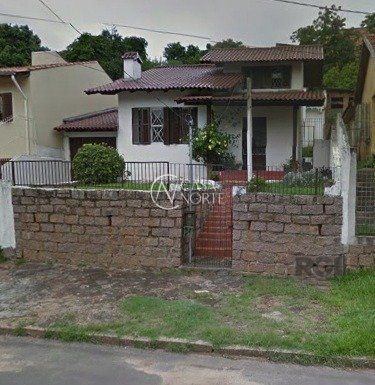 Casa à venda com 2 quartos, 100m², 1 vaga, Rua Henrique Fraeb no bairro Partenon em Porto Alegre