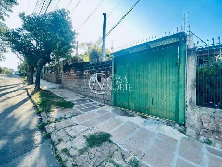 Casa à venda com 4 quartos, 124m², 5 vagas, Rua Padre João Batista Reus no bairro Camaquã em Porto Alegre