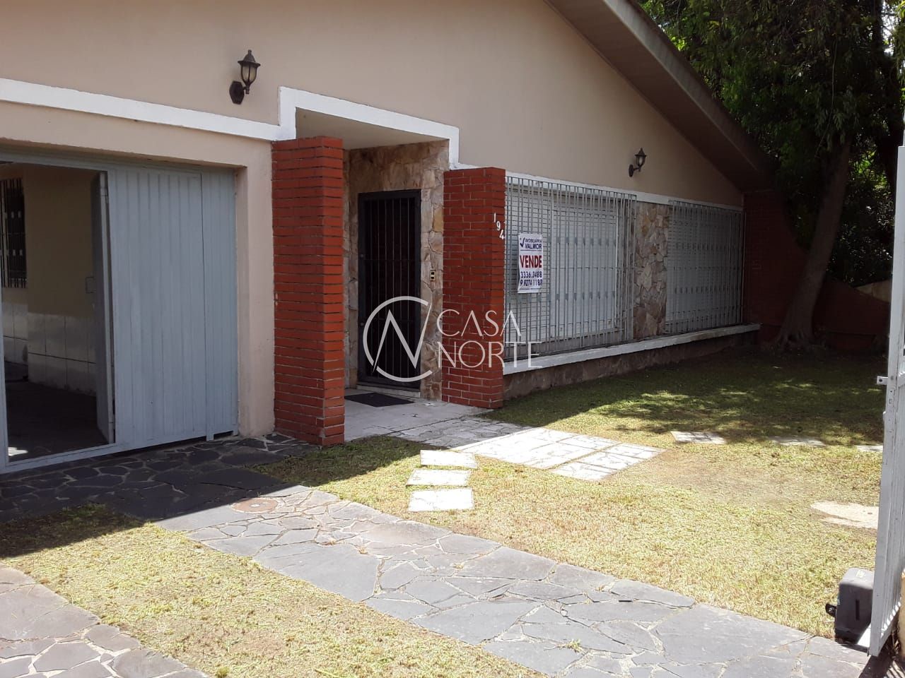 Casa à venda com 4 quartos, 218m², 1 suíte, 4 vagas, Rua Doutor Pedro Motta no bairro Partenon em Porto Alegre