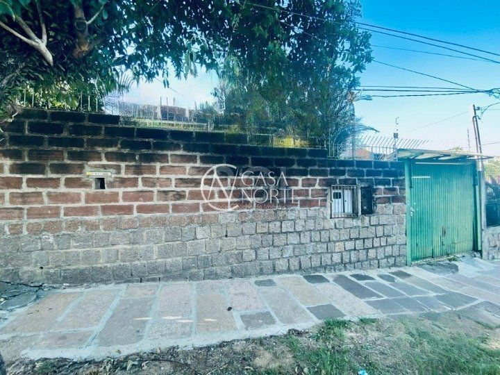 Casa à venda com 4 quartos, 124m², 5 vagas, Rua Padre João Batista Reus no bairro Camaquã em Porto Alegre