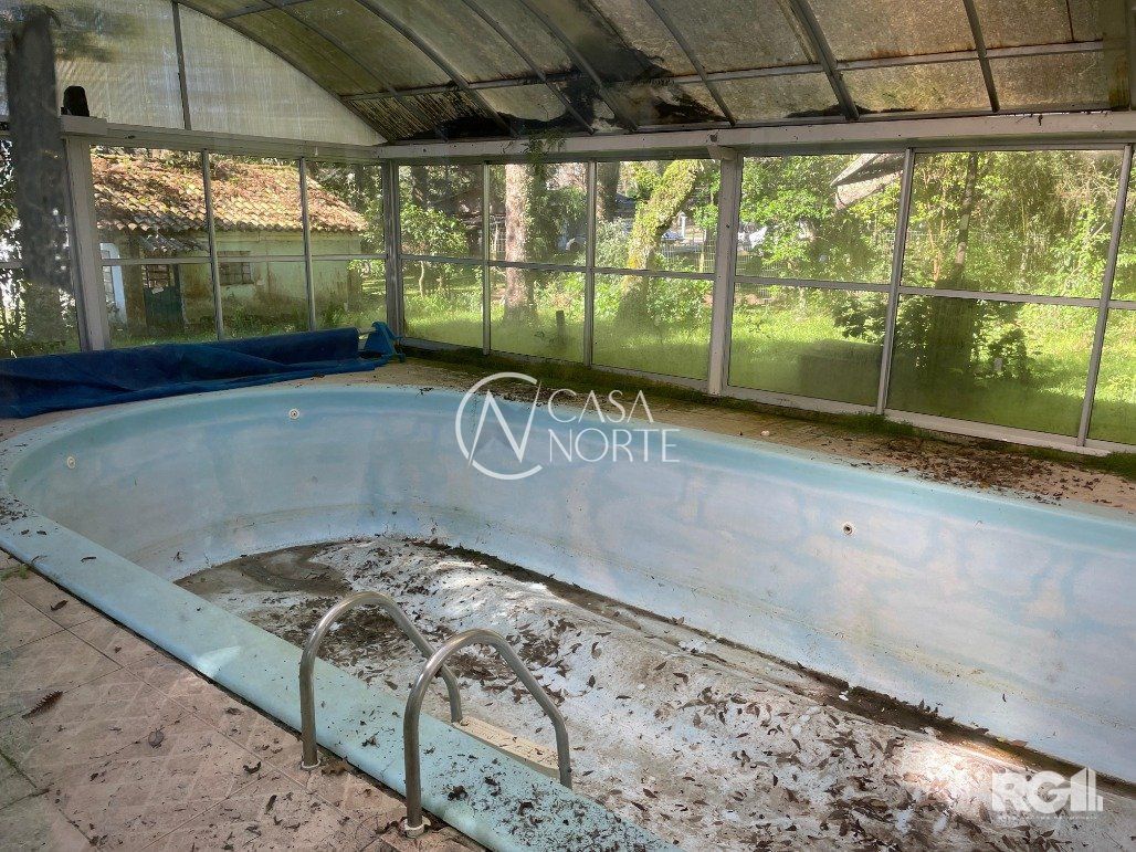 Casa de Condomínio à venda com 3 quartos, 166m², 1 suíte, 3 vagas, Avenida Coronel Marcos no bairro Pedra Redonda em Porto Alegre