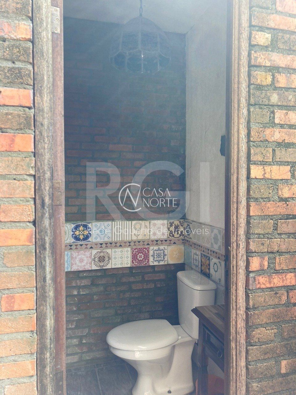 Casa à venda com 3 quartos, 400m², 1 suíte, 2 vagas, Rua Fagundes Varela no bairro Santo Antônio em Porto Alegre