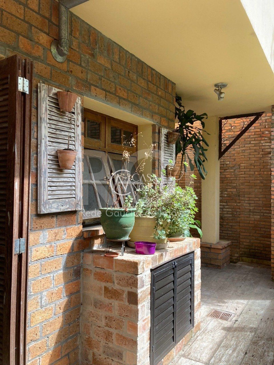 Casa à venda com 3 quartos, 400m², 1 suíte, 2 vagas, Rua Fagundes Varela no bairro Santo Antônio em Porto Alegre