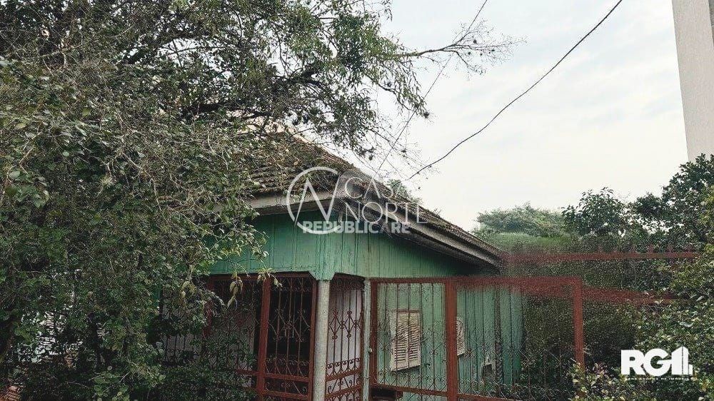 Casa à venda com 2 quartos, 150m², 1 vaga, Travessa Serafim Terra no bairro Jardim Botânico em Porto Alegre