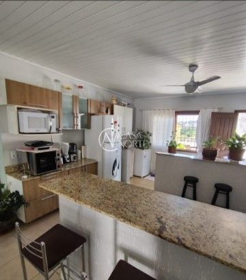 Casa à venda com 2 quartos, 139m², 4 vagas, Rua Doze de Outubro no bairro Partenon em Porto Alegre